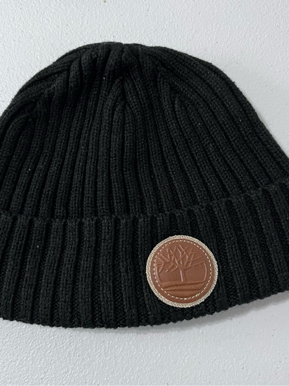 Timberland Black Ribbed Beanie with Brown Leather Logo